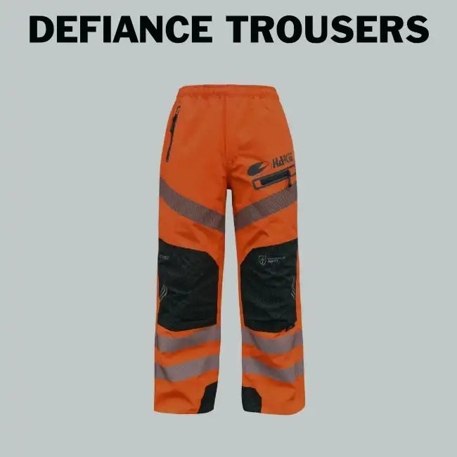 Bright orange high-visibility trousers with black reinforced knee panels and reflective gray stripes.