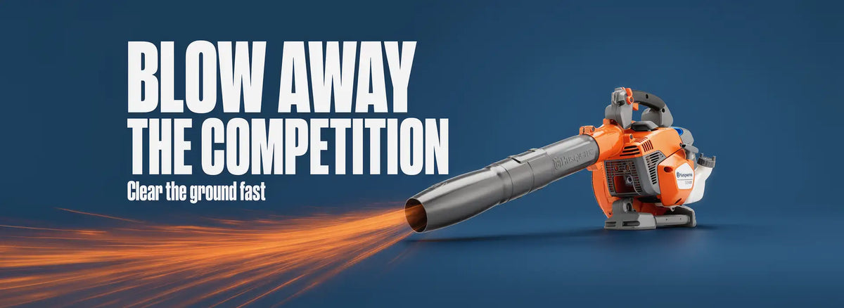 Orange and white husqvarna gas-powered leaf blower with a long metallic nozzle.