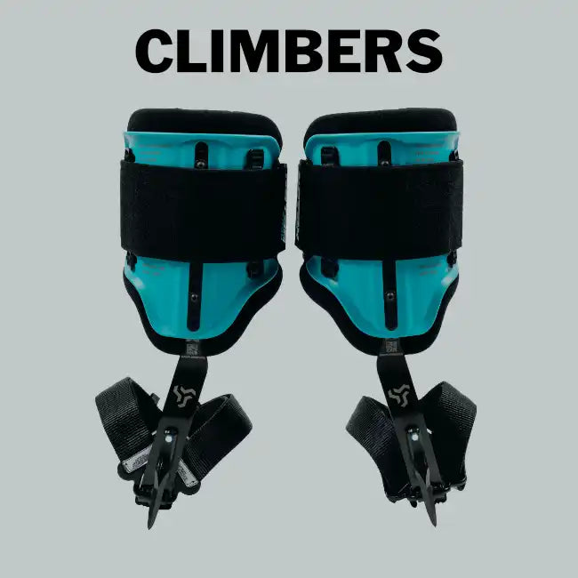 Pair of teal and black tree climbing spikes